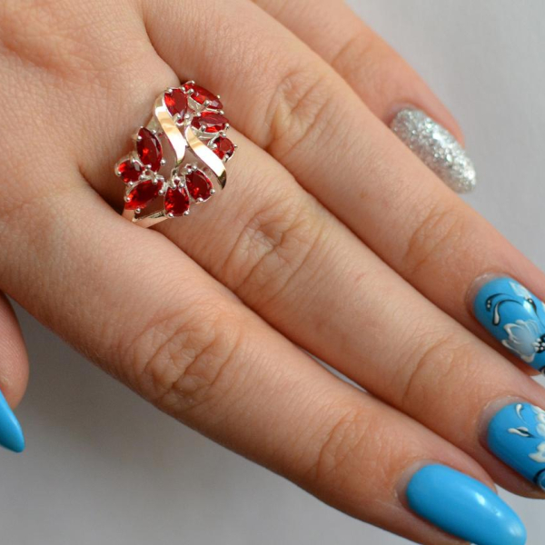 Срібна каблучка з золотими вставками