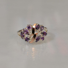 Срібна каблучка з золотими вставками