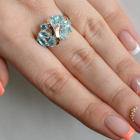 Срібна каблучка з золотими вставками