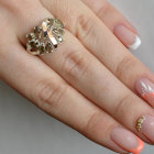 Срібна каблучка з золотими вставками