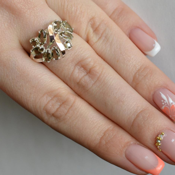 Срібна каблучка з золотими вставками