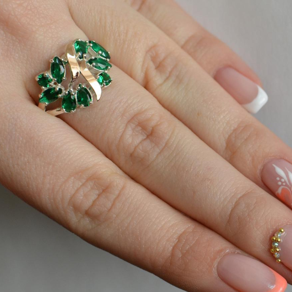 Срібна каблучка з золотими вставками