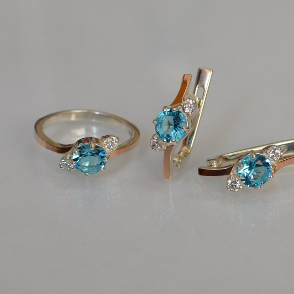 Срібний комплект з золотими вставками