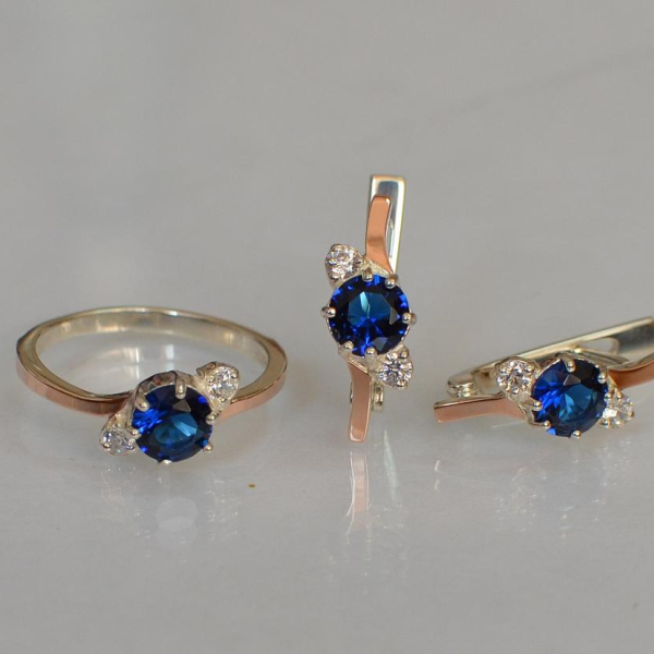 Срібний комплект з золотими вставками