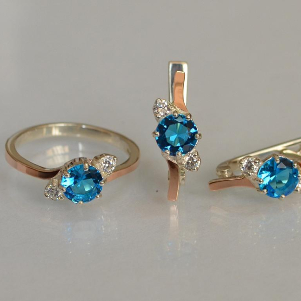 Срібний комплект з золотими вставками