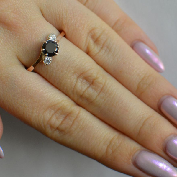 Срібна каблучка з золотими вставками