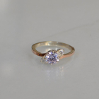 Срібна каблучка з золотими вставками