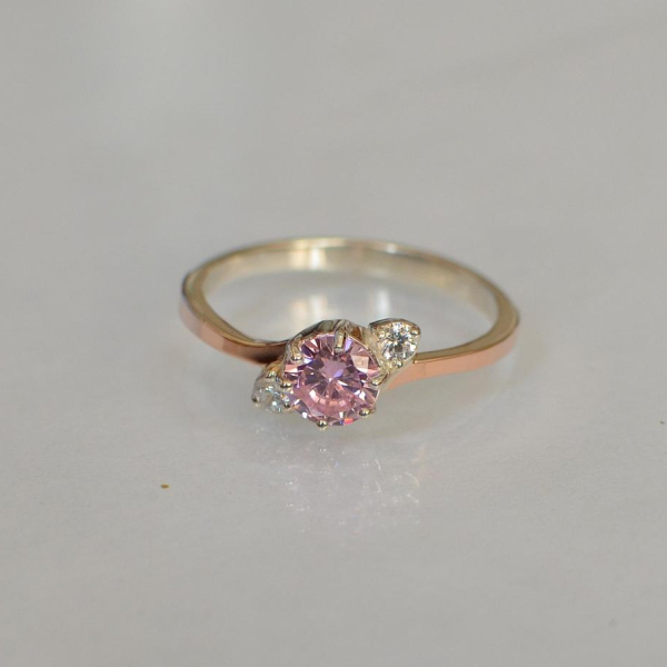 Срібна каблучка з золотими вставками