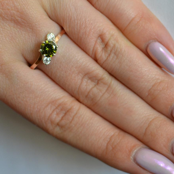 Срібна каблучка з золотими вставками