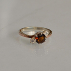 Срібна каблучка з золотими вставками