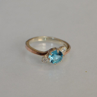 Срібна каблучка з золотими вставками