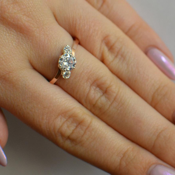 Срібна каблучка з золотими вставками