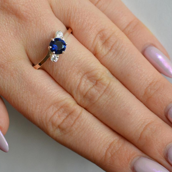 Срібна каблучка з золотими вставками