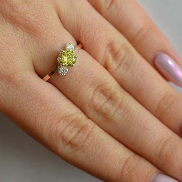 Срібна каблучка з золотими вставками