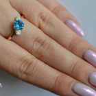 Срібна каблучка з золотими вставками