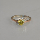 Срібна каблучка з золотими вставками