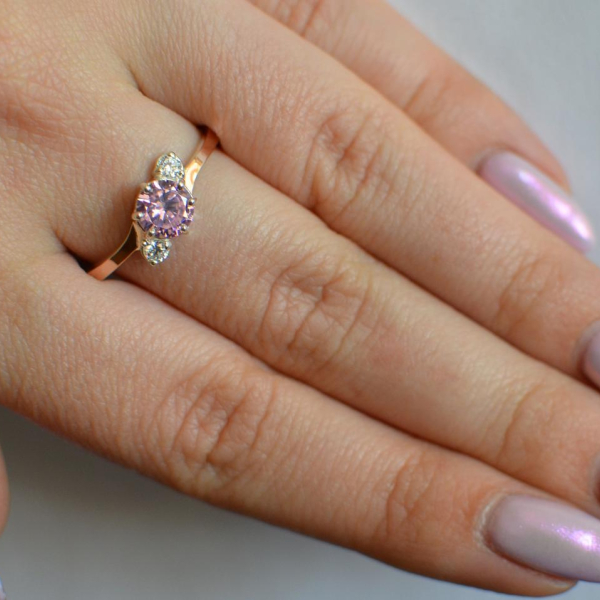 Срібна каблучка з золотими вставками