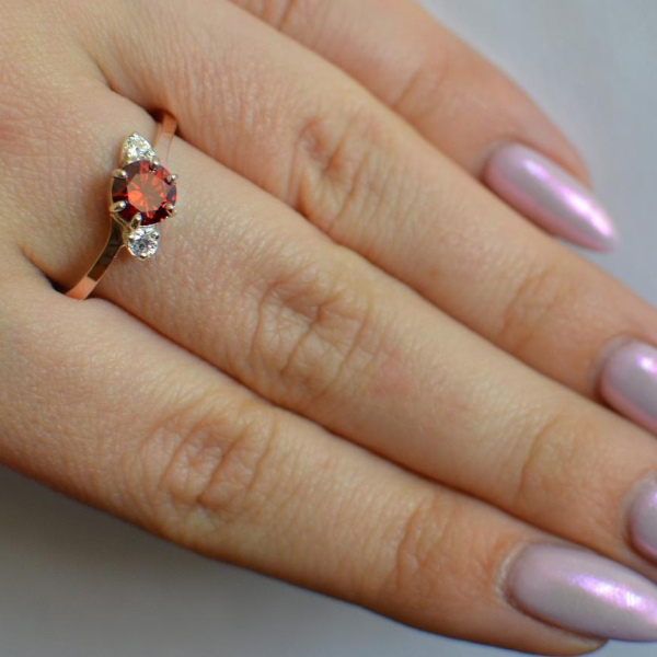 Срібна каблучка з золотими вставками