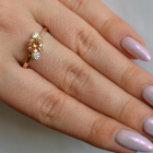 Срібна каблучка з золотими вставками