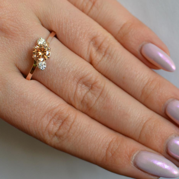 Срібна каблучка з золотими вставками