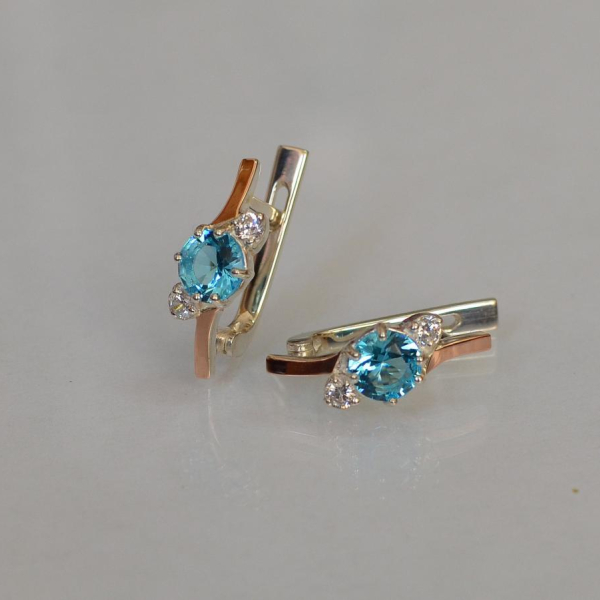 Серебряные серьги с золотыми вставками