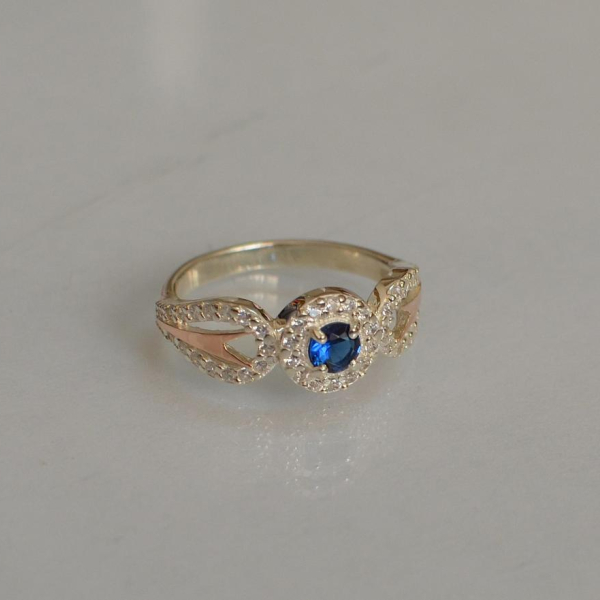 Срібна каблучка з золотими пластинами