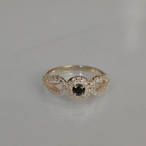 Срібна каблучка з золотими пластинами