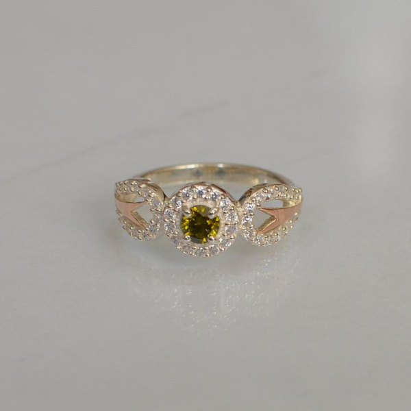 Срібна каблучка з золотими пластинами