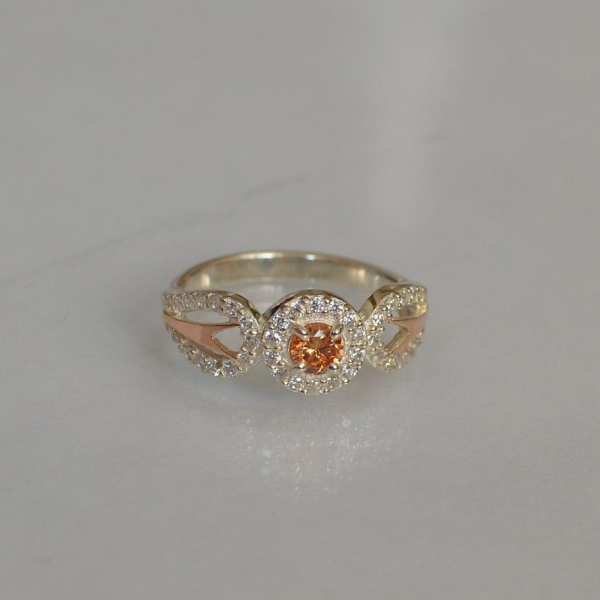 Срібна каблучка з золотими пластинами