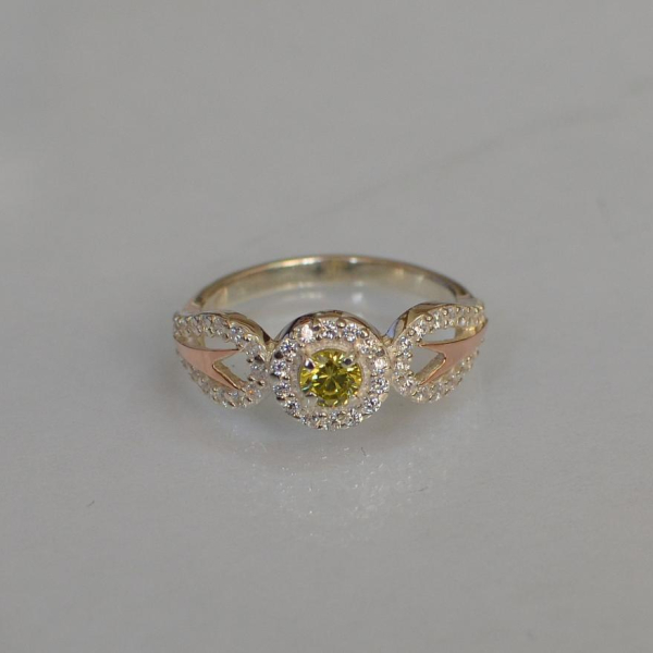 Срібна каблучка з золотими пластинами