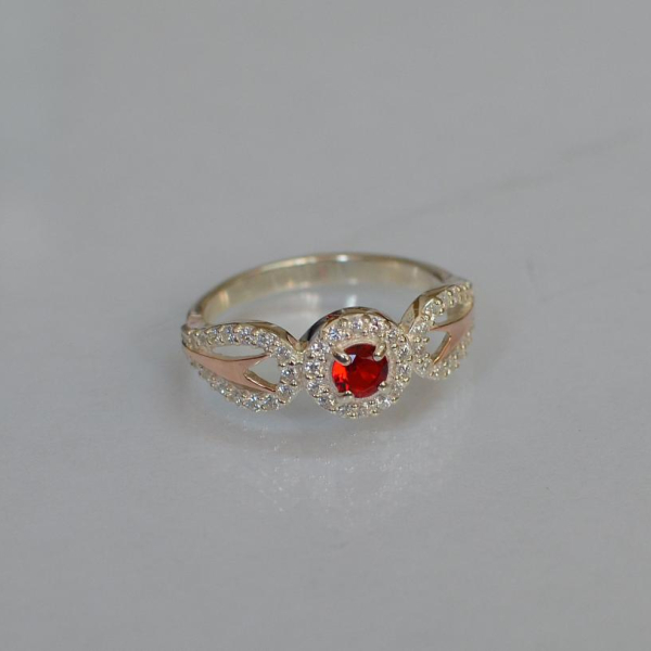 Срібна каблучка з золотими пластинами