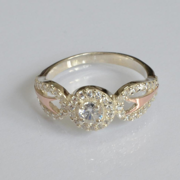 Срібна каблучка з золотими пластинами