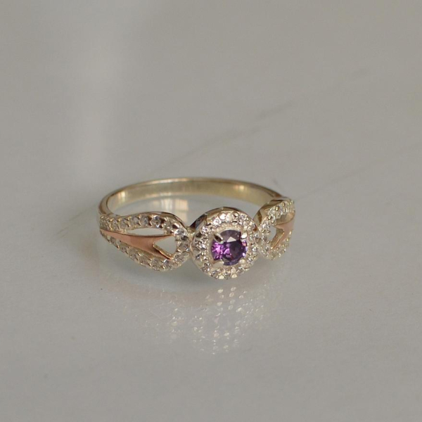 Срібна каблучка з золотими пластинами