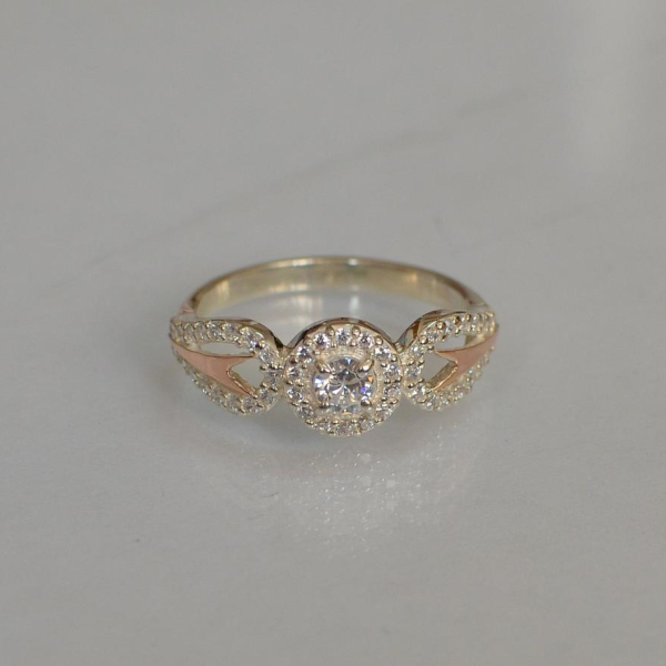 Срібна каблучка з золотими пластинами