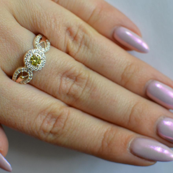 Срібна каблучка з золотими пластинами