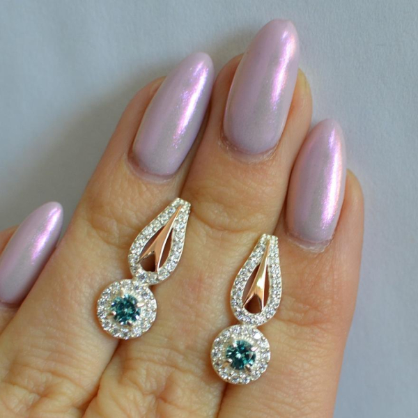 Срібні сережки з золотими пластинами