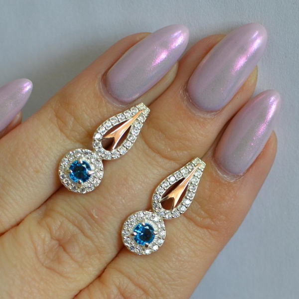 Срібні сережки з золотими пластинами