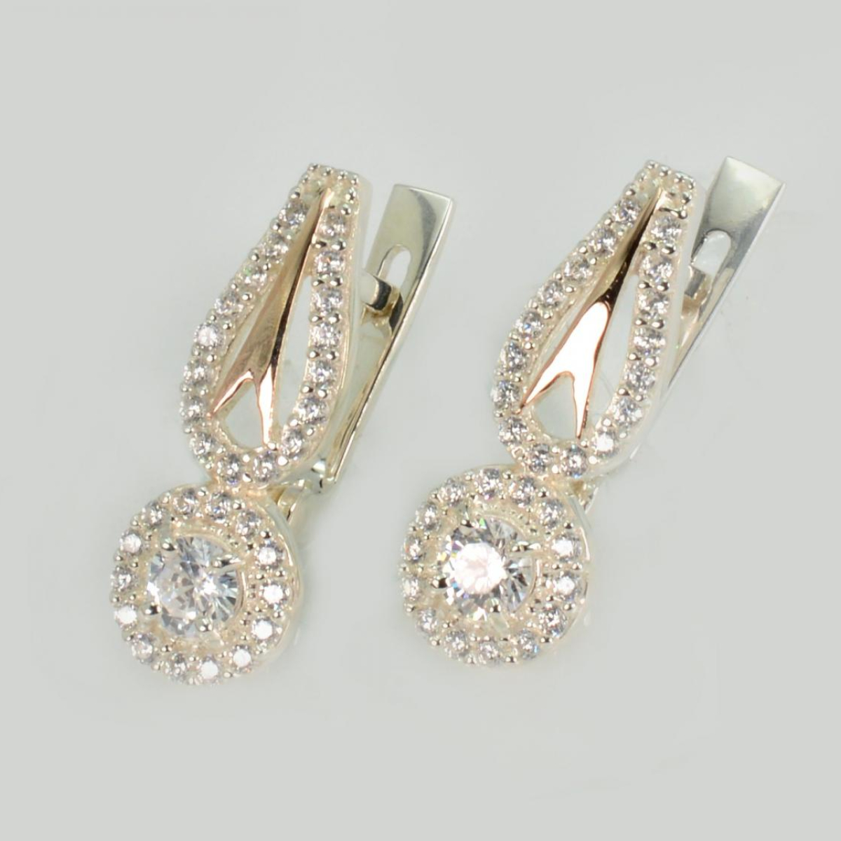 Срібні сережки з золотими пластинами