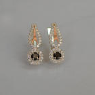 Срібні сережки з золотими пластинами