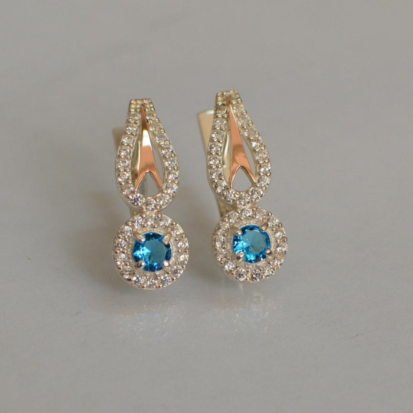 Срібні сережки з золотими пластинами