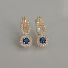 Срібні сережки з золотими пластинами