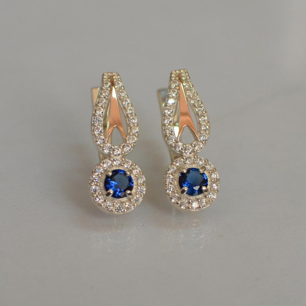 Срібні сережки з золотими пластинами