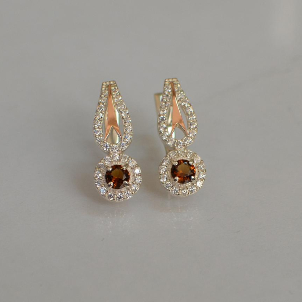 Срібні сережки з золотими пластинами