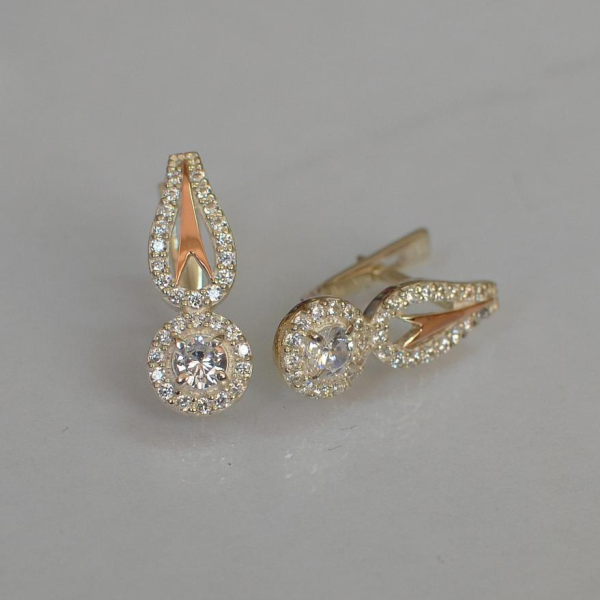 Срібні сережки з золотими пластинами