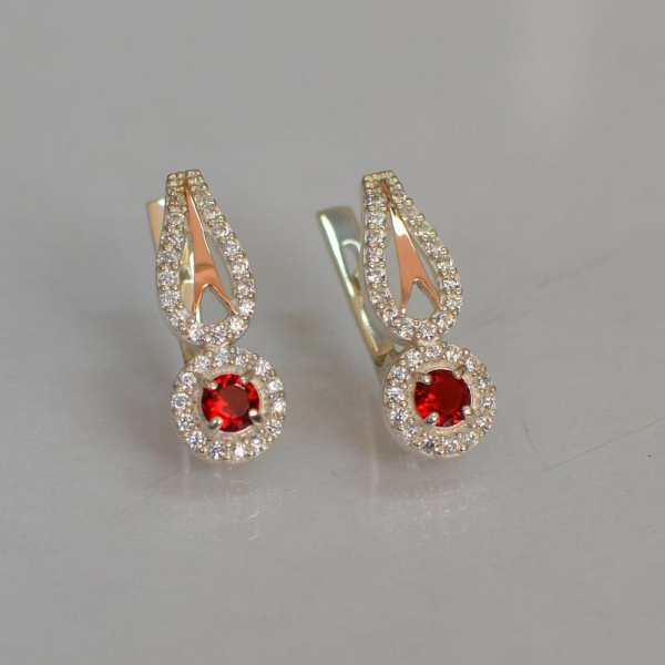 Срібні сережки з золотими пластинами