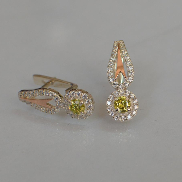 Срібні сережки з золотими пластинами