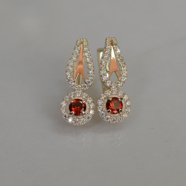 Срібні сережки з золотими пластинами