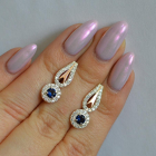 Срібні сережки з золотими пластинами