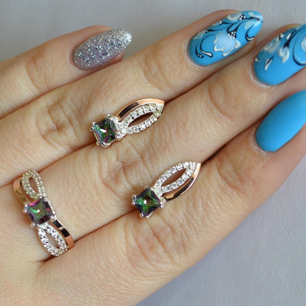 Срібний набір з золотими вставками