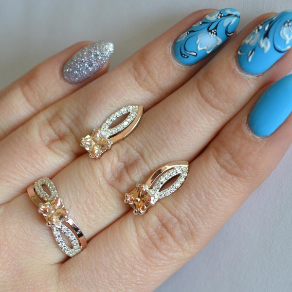 Срібний набір з золотими вставками